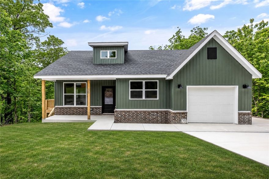 This thoughtfully designed new construction proves you don’t have to sacrifice quality for efficiency. Every inch of this home was crafted with intentional design and upscale finishes, offering the style and feel of a much larger property without the excess maintenance. Quartz countertops, durable LVP flooring throughout, and elevated finishes create a clean, modern feel, while the oversized kitchen island offers ample seating space for hosting guests, casual dining, or everyday life. The one-car garage adds convenience and extra storage, while the location — just half a mile from the Back 40 Trail Head Parking — provides easy access to some of the area’s best biking and outdoor recreation. Whether you’re looking to downsize, purchase your first home, or invest in a low-maintenance property with elevated finishes, this home delivers quality where it counts.