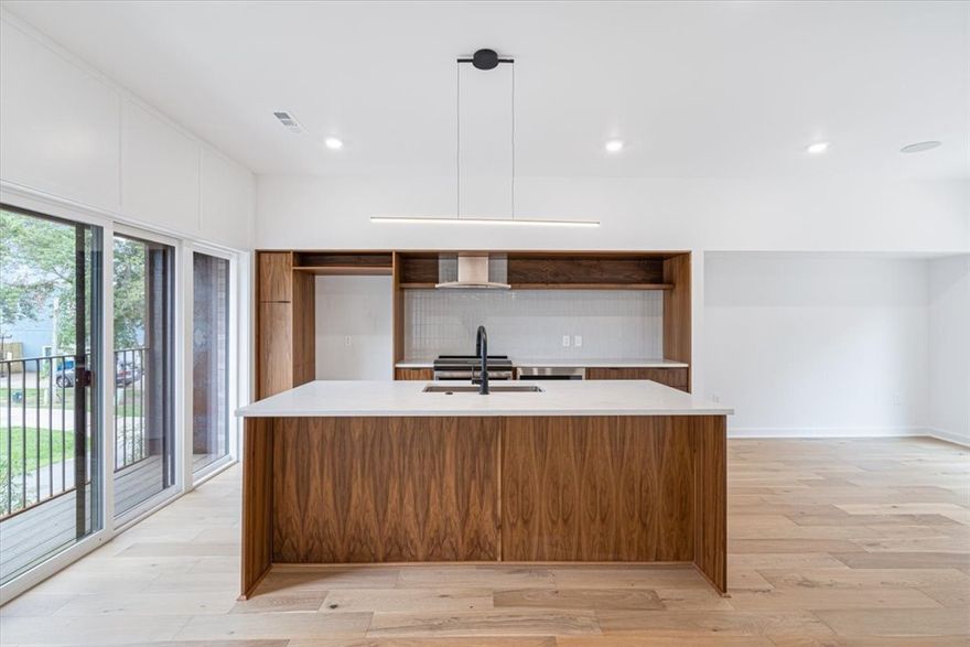 Modern new construction 2 bedroom / 2.5 bath condo situated directly across the street from The Momentary, 8th St Market, & Razorback Greenway! Located in the heart of downtown Bentonville and walking distance to the new Wal-Mart home office. This residence boasts custom-built walnut cabinets, quartz countertops, integrated Sonos speakers, tons of natural light, wood floors, built-ins, and high-end finishes throughout! This open-concept plan is thoughtfully designed and includes an attached 2-car garage, private covered patio, and an upstairs loft/office. Eligible for secondary market financing!