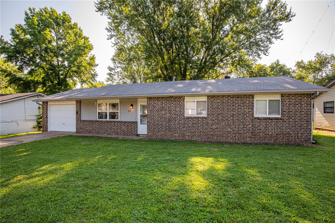 Fantastic opportunity to break into the Rogers market with this 3 bed 1.5 bath with attached garage just 1.5 miles to I49, Chick-fil-A, and Rick's Bakery. Brand new AC, newer water heater, and insulation will make it worry-free on those big-ticket items. You'll enjoy the nice back yard with a established trees.Sold as is.