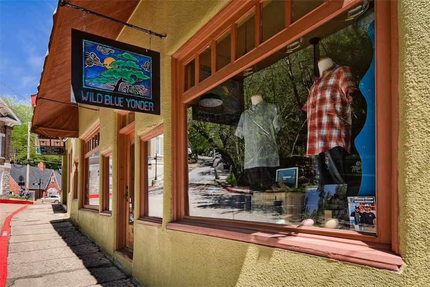 Prime retail location on busy Spring Street in Eureka Springs’ downtown shopping and nightlife district. The space has as a long history as a high-end outdoor apparel shop and includes storage and dressing areas as well as restroom. The 800 square foot space is part of a condominium building. With a high foot and vehicle traffic count and large display windows, this welcoming space is only limited by your imagination. Entrepreneurs, bring your great idea and make it a reality in the heart of Eureka Springs!