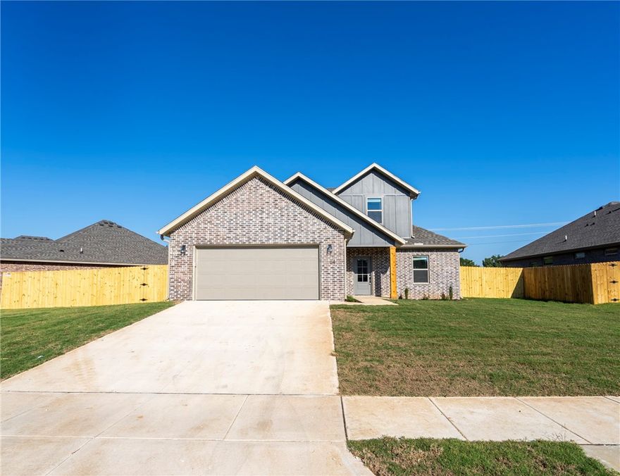 Charming 3 bed, 2 bath brick home located in the desirable Summerfield subdivision in Farmington. This home offers a bright, open-concept layout with wood-look tile flooring, a cozy gas fireplace, and abundant natural light throughout the main living space. The kitchen features granite countertops, subway tile backsplash, SS appliances including a gas range, & a spacious walk-in pantry. The primary suite includes dual vanities, tiled walk-in shower, while additional bedrooms provide flexibility for guests, roommates, or a home office. Enjoy outdoor living with a covered patio and fully fenced backyard. Conveniently located just minutes from Creekside Park, Kessler Mountain Regional Park, and the Razorback Greenway, with easy access to the University of Arkansas, I-49, shopping, dining, and everyday amenities.