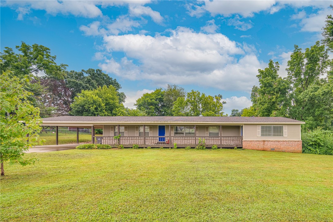 LOCATION! In the heart of cave springs, only minutes from Bentonville or Springdale. A lot of room on over half an acre lot, with 4 bedrooms one of them being large enough to be a second living room. There is an additional office that could double as a 5th bedroom but does not have a second form of egress. Whole house plumbing replaced 2015, new duct work in 2016, new roof 2015, new furnace 2020, new HVAC and outside unit 2021. Kitchen updated 2021 featuring new granite, backsplash, sink, faucet, and paint!