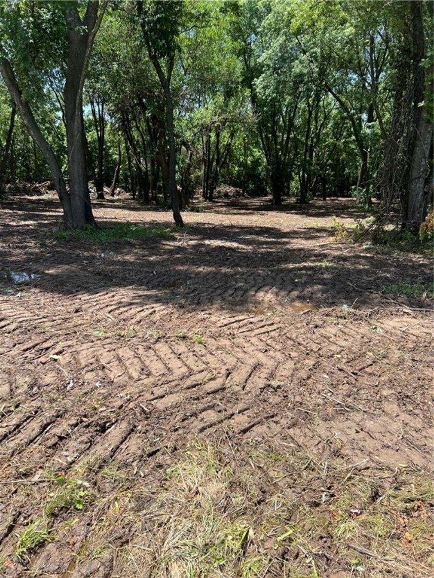 Excellent development potential! Already zoned for Multi-family Large Scale Development. Zoned for as many as 44 units. Already conceptionally designed for 30 units. (See "Attachments") Utilites on site.