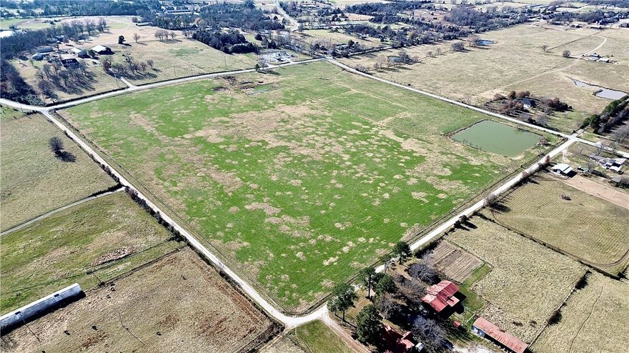 Endless development potential with this 40 acres in Springdale.