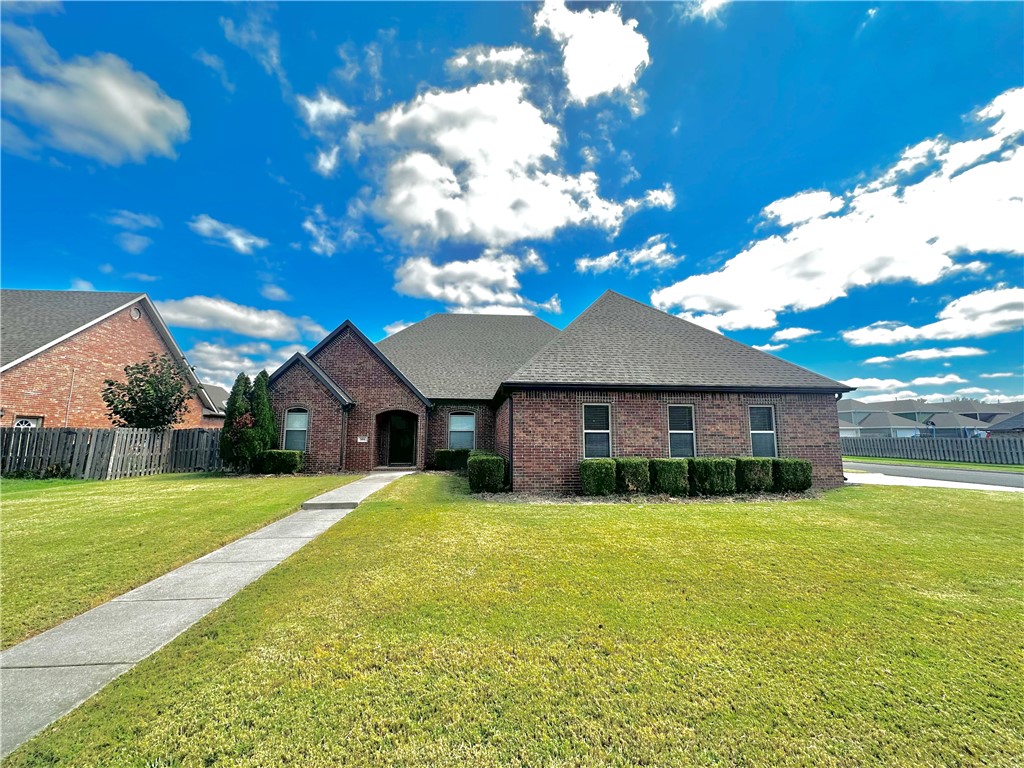 Experience luxury and comfort in this exceptional all-brick home, perfectly situated on a desirable corner lot. With 4 spacious bedrooms and 3 full baths, this residence offers ample space for entertaining family and friends. The enclosed back patio offers a cozy fireplace and enjoy the privacy of the fenced-in backyard. The generous 3-car garage provides plenty of space for vehicles and storage. LED lighting throughout the home. Wood, title and carpet. Don't miss this great opportunity to live in this perfect home.