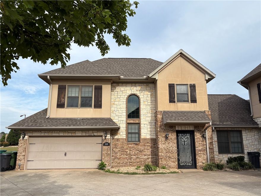 Enjoy condo living in a super location! Near Pinnacle & Uptown Rogers entertainment, shopping & restaurant district or hop on the Blossom Way & Razorback Greenway Trails. Great floor plan with large open living, kitchen and dining, separate pantry and laundry rooms and primary bedroom suite on the main level. The upper level includes the second bedroom suite, large open landing room with separate nook room. The back patio and two car garage with extra storage round out the versatile & spacious plan. All appliances included and the Owner maintains the yard & landscaping.