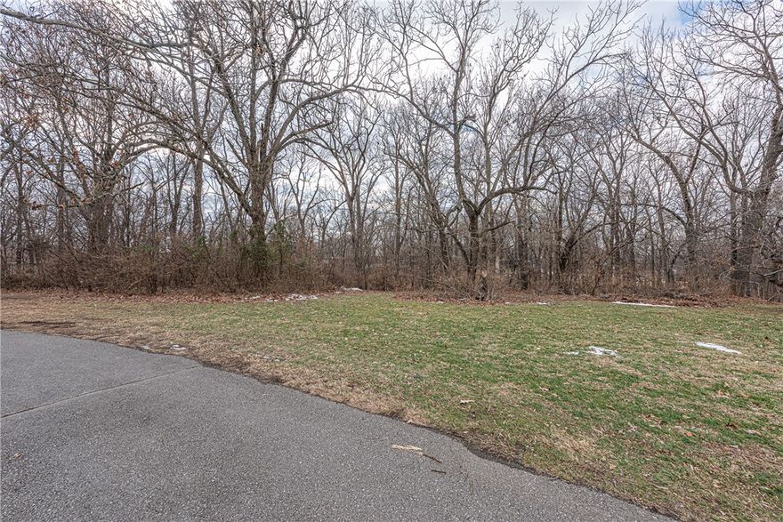 Ready to build? This ±0.49-acre lot in the Shady Oaks Subdivision offers a great blend of open and wooded space, with a cleared area ideal for a future home site and mature trees providing natural privacy. Located on a cul-de-sac, the property offers a tucked-away feel while still being conveniently close to I-49, Springdale, Johnson, Lake Fayetteville, and surrounding amenities. Public water, public sewer, and electricity are available at the street. A great opportunity for buyers looking to build in an established neighborhood!