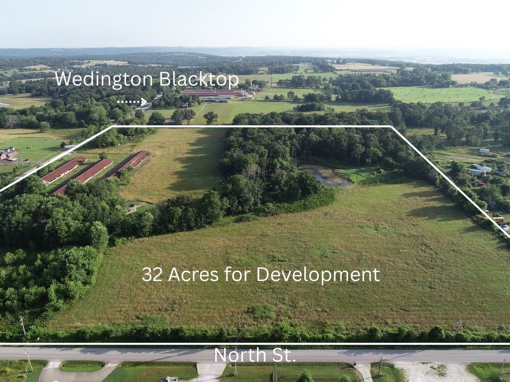 Development property for sale. This 32 acres is located .5 miles from Lincoln High School and 300 yards from Highway 62. This property features level ground with multiple access points from Wedington Blacktop or North St. Mostly open ground with two retired poultry houses for minimal demolition requirements. Sewer located at corner of site next to industrial sites, and water would have to be worked out with City of Lincoln. This property is worth checking out with its prime location in between Prairie Grove and Lincoln. Please call Agent for showing requirements.