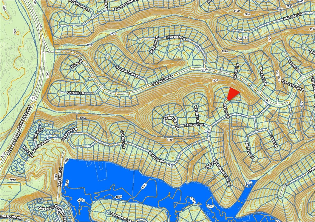 LOCATION! Very gently sloped lot--this exceptionally located lot is a few minutes from Bella Vista Way retail and restaurants. Quiet cul-de-sac, undeveloped lots on either side and expansive common area behind ensures wooded nature views. Bentonville schools. Build your home in Bella Vista and enjoy access to 7 recreational lakes, 6 golf courses, rec centers, and 150 miles of world class bike and hike trails and more!