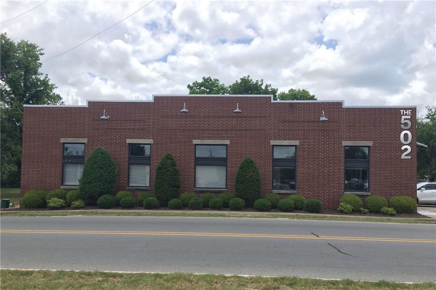 The 502 is located at the crossroads of the vibrant Bentonville Arts and Market Districts.  Converted from single tenant industrial/office to multi tenant Class A office building.  New glass entrance door, painting, flooring and lights in the 409 SW B and new office entrance on SW A St.  All new plumbing, bathrooms, expanded electrical, and upgraded HVAC unit.  New LED lighting systems with substantial long term utility savings.
