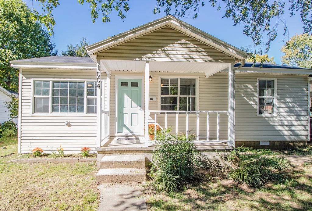 Completely remodeled ADORABLE home in an established neighborhood near growing downtown Rogers! New roof, new floors, completely new kitchen, stainless steel appliances, completely new bathroom, third bedroom can be a master or opens up to make two living areas, wood deck, beautiful large backyard, storage shed, covered carport for parking, and so much more! Full one year home warranty included with purchase. Come see this beautiful home for yourself!