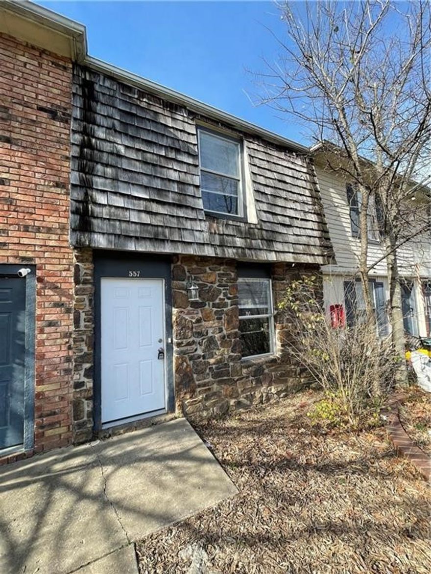 Nice 2 bedroom, 1.5 bath townhome. Wood floors downstairs, carpet in bedrooms, all appliances, fenced back yard, new paint throughout.