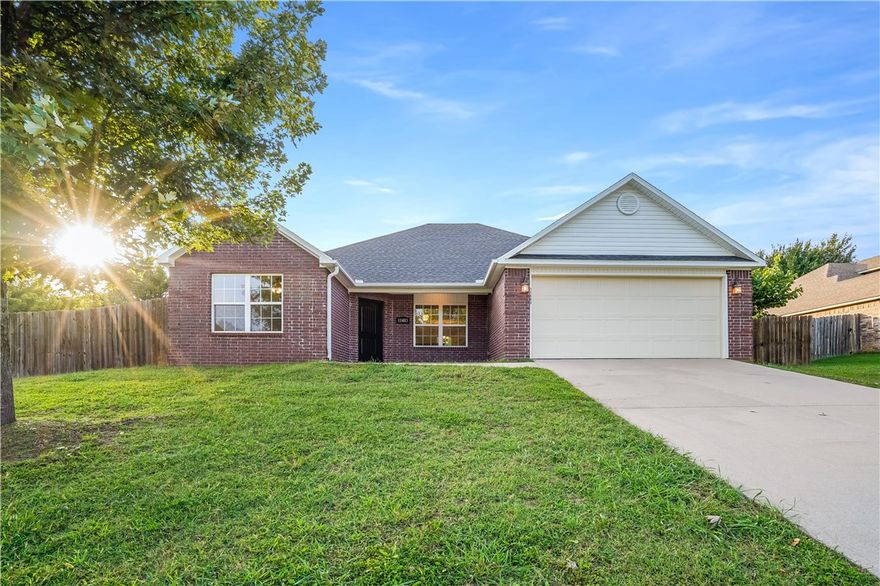 Step into this 4-bedroom, 2-bath beauty with brand-new carpet and fresh paint throughout—all you have to do is unpack and enjoy. The bright, open living space flows effortlessly into the kitchen and dining area, making it perfect for everyday living and weekend get-togethers. The private primary suite is your retreat with a full bath featuring both a tub and shower, while the extra bedrooms give you plenty of flexibility—think guest room, office, or playroom. Outside, the low-maintenance yard keeps life simple, and the location couldn’t be better: within 15 minutes to I-49 and the University of Arkansas and minutes from schools, shopping, and dining. Convenience. Comfort. Style. This home has it all—don’t miss your chance to make it yours!