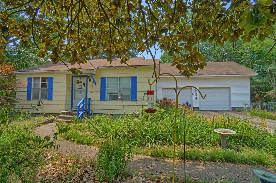 If you are looking for a rental, air b&b or a flip then you provide the sweat and we will provide the equity. Located of the west side of russellville makes it Convenient and close to everything our town has to offer. The house is three bedrooms, two full baths and it is as cute as it can be. You will love the yard, the covered patio and the separate garage/shop. There is nothing like it in the price range for sale right now. Don't wait!! This home will be sold as is. You can still do an inspection but seller will not make repairs.