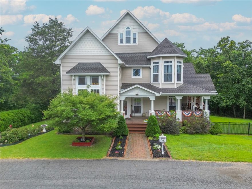 Big wraparound porch, oversized rooms, and three levels of space—that’s just the start. This Victorian-style home sits on a large lot and includes the parcel across the street. Inside, you’ll find all-new carpet throughout, updated tile in upper bathrooms, and recent upgrades like a new water heater, HVAC systems on both main and upper floors, and a freshly painted interior. The unfinished basement is 768 sqft. Includes a fireplace, Pella doors, a vapor barrier, dehumidifier, sump system, and a newly rebuilt back deck with added stairs leading to a fenced yard. Plenty of charm, tons of updates, and room to grow. Includes lot across the street.