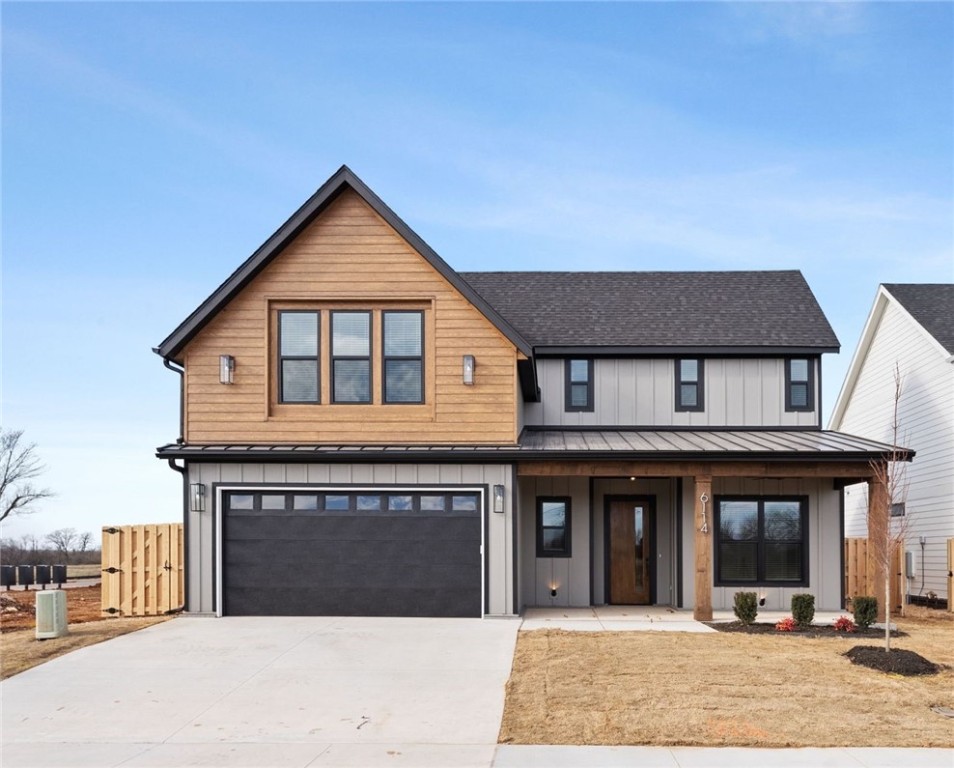 Fantastic opportunity in brand new subdivision in highly sought SW Rogers! This LIKE NEW transitional semi-custom home features an expansive open floorplan with wood beamed, vaulted ceilings - making it ideal for entertaining. The main floor features a chef's kitchen with built in microwave and oven, adjacent to a custom vent hood atop your gas cooktop. Upper mullion cabinetry throughout the kitchen surround the expansive waterfall island! Completing the main floor is the primary bedroom with an immaculately designed en-suite bathroom. Hardwood treads lead you upstairs to 3 additional bedrooms and 2 full bathrooms. Not to be overlooked is your fully fenced backyard to enjoy from your serene covered patio with ceiling fans and in ground irrigation system. Prime location, minutes to shopping, schools and steps away from Greenway Trail - with countless upgrades throughout, don't miss this opportunity!
