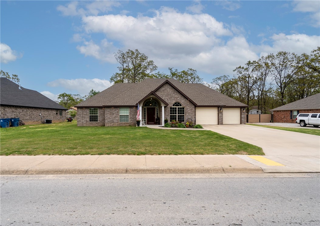 You're going to fall in love with this gorgeous brick home. Close to schools. Great for entertaining with a beautiful back yard. This home has granite countertops and crown molding. Lots of recessed lighting, wood floors, and fireplace in the family room. 4 bedrooms and a formal dining room. Whirlpool tub and separate tile shower. Take a look today