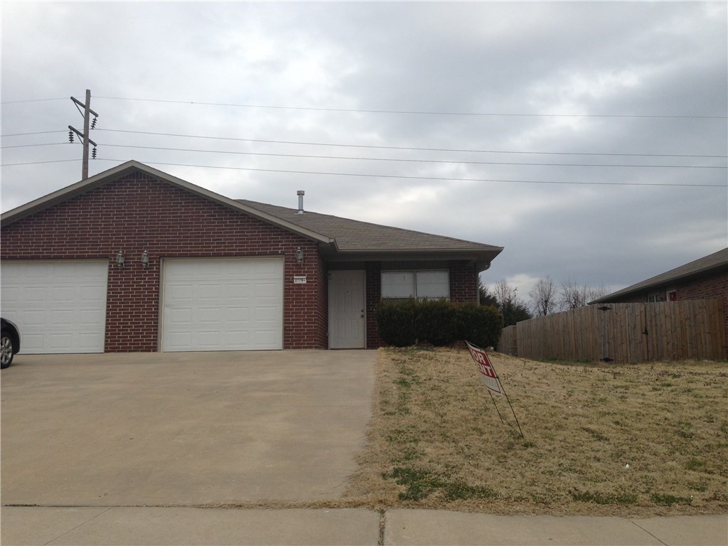 Two bedroom, two bath duplex in northeast Springdale available May 1. Refrigerator, washer, dryer included.