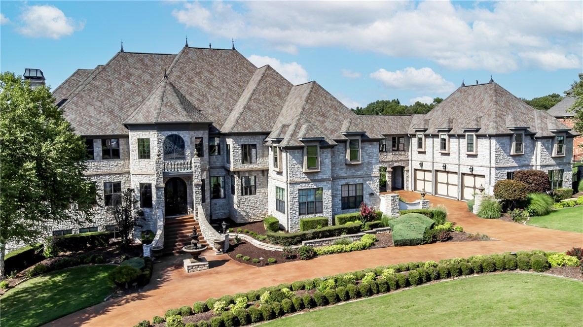 Welcome to your dream European estate! This custom luxury home in the exclusive Elm Springs gated subdivision offers 12,230 sqft of living space on 2.19 acres. With 8 bedrooms, 11 bathrooms, and two master suites, it's a one-of-a-kind gem.
Indulge in a chef's kitchen, refined office, wine cellar, and basement bar with a game room. Enjoy the theater room with platform seating or relax in the serene tea room with an indoor waterfall. Additional features include a sauna, safe-room, and mother-in-law apartment.
The resort-style backyard delights with multiple pools, an infinity waterfall, stone bridge, fire rings, jacuzzi, and outdoor kitchen. Admire the breathtaking views of the exquisitely landscaped property.
Recent updates include a new roof (2020), 3 HVAC systems, water heater, pool pumps & electronics, and exterior sound system. Don't miss out on this masterpiece! View the amenity list for more details and turn your dreams into reality now!