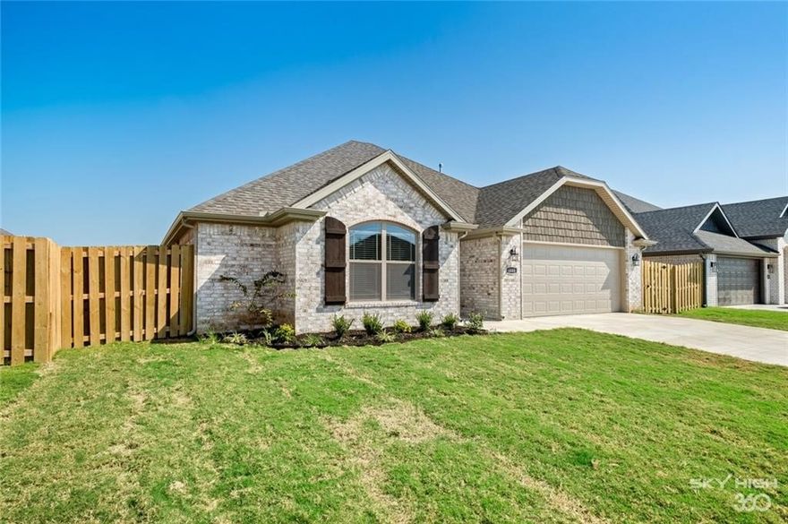 This beautiful new all-brick home features 3 bedrooms and 2 bathrooms. the split floor plan and open concept create a spacious and inviting atmosphere. The living room boasts a gas fireplace and crown molding, and throughout the home. The master suite is a highlight, offering a whirlpool tub, walk-in shower, and a generous walk-in closet. Additional amenities include energy-efficient features, a covered patio, a fully privacy-fenced backyard, a garage door opener with keypad entry, and pull-down attic storage.