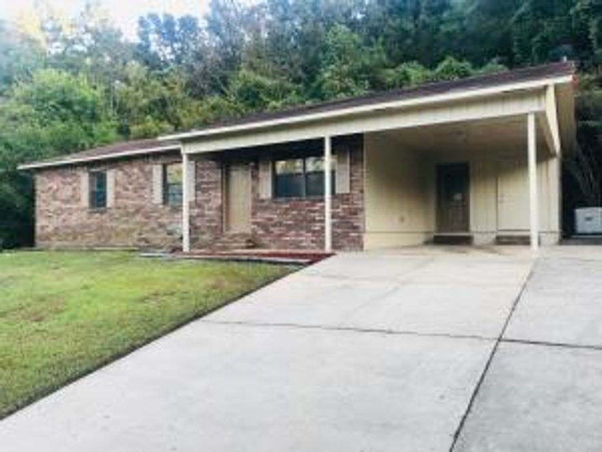 A house that you must show!3 rooms 2 full baths in a wonderful location.Totally remodel ready for a family to just move in.Brick home under $130,000.