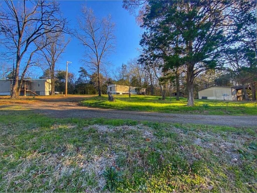 income-producing mobile home park on 1.5 acres of unrestricted land. Property includes three mobile homes, all fully rented and generating consistent cash flow. Utilities are already installed and servicing each unit. With no known restrictions, there is potential for future expansion or additional development. Great opportunity for investors looking for steady returns and long-term growth.