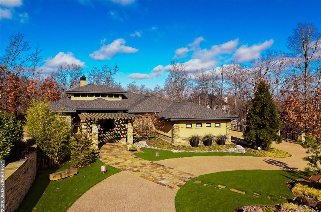 Impeccable Quality and Design in the Style of Fay Jones awaits the discriminating Buyer in this Fabulous Custom Home. Located in Clear Creek, a Gated Golf Community. Many amenities include 4 BD. 3.5 baths, Chef's Kitchen, Bonus, Media, L.R., Formal Dining, Sunroom/Studio, a Japanese Garden. Entertainer's Dream, with Pool and Waterfall in Hot Tub with Covered Patio. Peaceful and Private Setting in cul-de-sac.