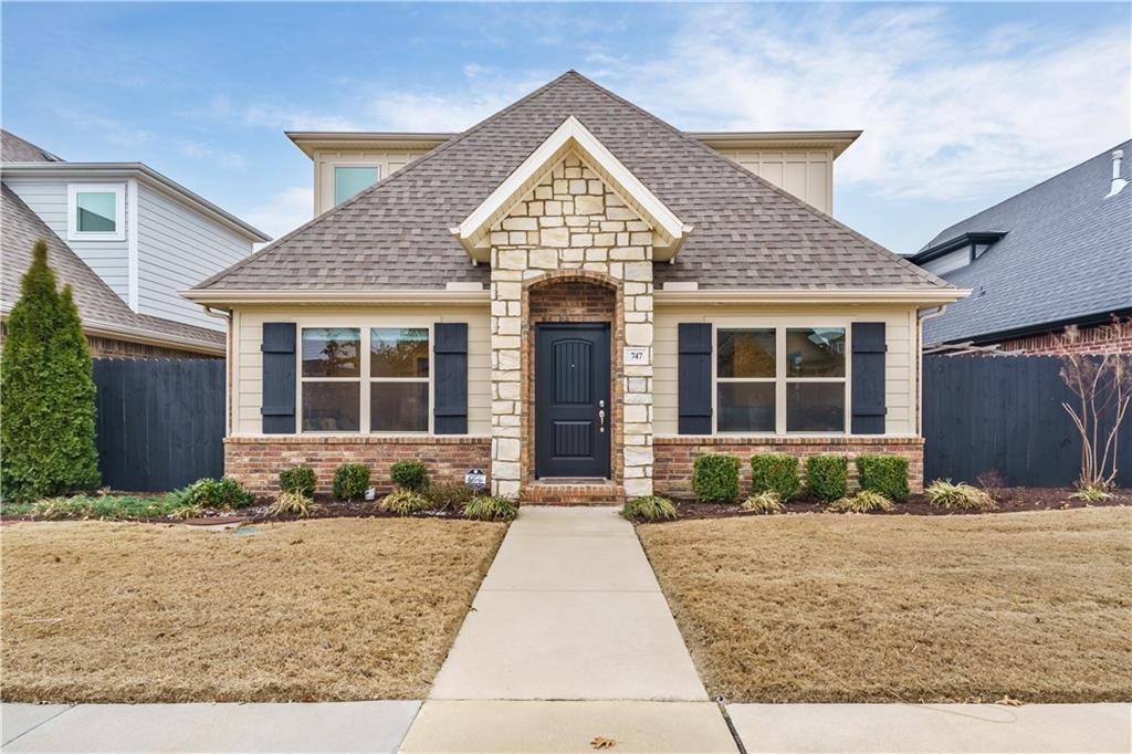Are you looking for a 4 bedroom home to rent for the upcoming University of Arkansas year? Are you looking for a 4 bedroom rental for your family? Whatever your reason, here it is! Downstairs you will find an open living concept with an open kitchen with island with room for bar seats, lots of granite counter space, plenty of cabinets and dining area. A half bath for guests and the laundry room comes with a washer and dryer, both just off the kitchen. The primary bedroom with ensuite is on the main floor. Hang out on patio around the firepit under the pergola in fenced area for privacy. Upstairs adds 3 more bedrooms with one having an ensuite while the other two share a jack and jill bathroom. The top of the stairs landing allows for a study area or set up a kitchenette. This prime location in Fayetteville gets you to shopping, local dining and 2.2 miles (less than 10 minutes) from U of A. Home comes with all appliances and lawn care is taken care of by HOA. Swim in the community pool that is just around the corner