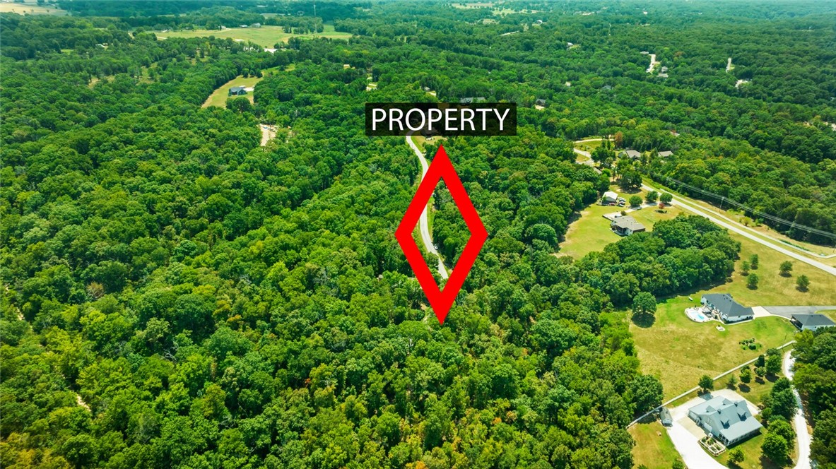 Discover the potential of this large lot located at the end of a quiet cul-de-sac. This listing features two adjacent lots, sold together as a single parcel. The sloped terrain has been prepped with a perc test, and an engineer has approved the site for a 4,500 sq ft home, complete with a preliminary septic plot design. With only a few other homes on the street, this property offers a unique opportunity to build your dream home in a peaceful setting. Donāt miss out!
