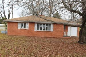 All brick 2 BR, 11/2 BA home on near level lot close to Bull Shoals Lake & launch area. Large living room, fireplace, & extra room for office or workshop. Property was built prior to 1978 and lead based paint potentially exists. All #'s are approx., age is estimate, sq. footage per assessor. Bank owned property selling 'As-Is'.