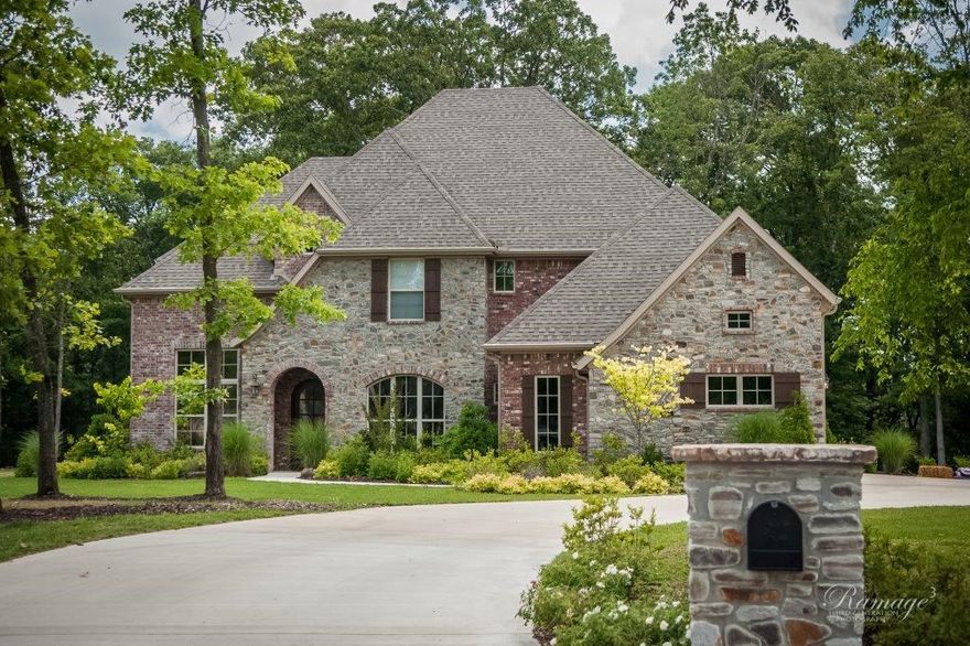 Gorgeous Custom Built home by David Harris, 2016. Located in quiet cul-de-sac on wooded 1.58AC. This 4651SF home features: 4 or 5 BR, 4 full BA, 2 half BA, wood flooring, bonus room w/wet bar, formal dining, office, loft-study w/built-ins, mudroom w/6 cubbies, oversized 3 car garage. Main level-large master suite w/large bath & large closet, large kitchen w/granite, prep island & sink, SS appl, double ovens, 5 burner gas cooktop, pantry, large open living area w/oversize windows, stone FP & built-ins, very spacious BR's w/walk-in closets, great outdoor living space w/large covered & uncovered patio w/stone firepit. Like new & move in ready!