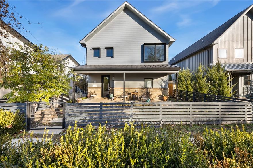 Luxury modern home in Downtown Bentonville, built in 2021 and located within walking and biking distance to the Bentonville Square, Crystal Bridges, and the Razorback Greenway. This 4-bedroom, 3.5-bath residence features an elegant open layout with vaulted ceilings and abundant natural light. The gourmet kitchen flows into the main living area, creating an inviting space for everyday living and entertaining. A covered front porch offers a relaxing spot for morning coffee, while a private fenced side yard provides an ideal area for outdoor dining. The spacious 2-car garage includes excellent storage plus additional on-site parking. Convenient access to the Walmart Home Office, Walton Blvd., and I-49 supports an easy lifestyle. Parks and trails are nearby, including Park Springs Park two blocks away with direct access to Slaughter Pen and Coler Preserve minutes by bike. This property is for additionally for lease. See listing ID#1330562