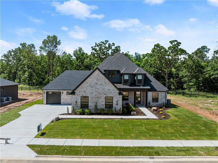 Introducing the 2025 Parade of Homes entry by Lance Johnson Building Company – a masterpiece of modern design and craftsmanship. This stunning property is a step above the rest, offering a truly customizable finish to make your dream home reality.  With 4 spacious bedrooms, a dedicated office functional as a 5th bedroom, a bonus room, and 4.5 luxurious bathrooms, you'll make yourself right at home! 

Additional features of the home include: A covered back patio with an outdoor kitchen: fridge, grill, and trash included, GE Monogram appliances including a refrigerator, upstairs bonus room with a wet bar, 3 of the 4 bathrooms with Walk-In showers, quartz counters, accent walls, and finishes made to your liking! 

Don’t miss this opportunity to own a show-stopping home that redefines modern living. Schedule your tour today!