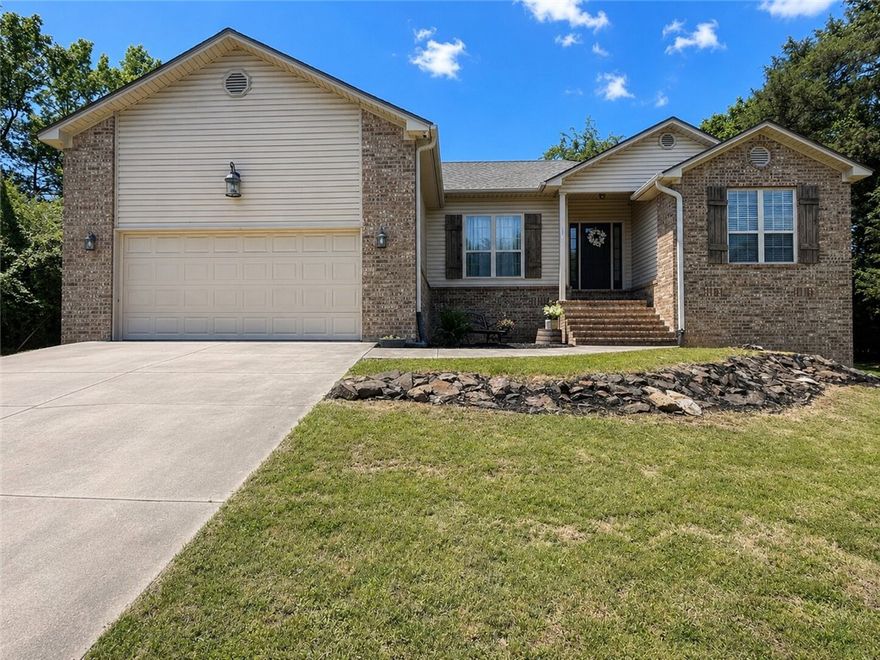 Gorgeous 4 bedroom 2 bath home on the SW side of Russellville. This home features tray ceilings, wood floors in the main living area and tile in the wet areas, newer appliances and light fixtures, formal dining area, breakfast room and a breakfast bar for extra seating. Large laundry room with sink. Private Master Suite with tray ceilings, jetted tub, separate shower, double vanity and walk in closet. Granite counters and subway tile back splash in the kitchen which is opens to the living room and breakfast area! Large back deck for entertaining guests, along with a firepit and no back yard neighbors for extra privacy. Enjoy 3 ample sized guestrooms, seperate from the master suite. This one checks all of the boxes!!