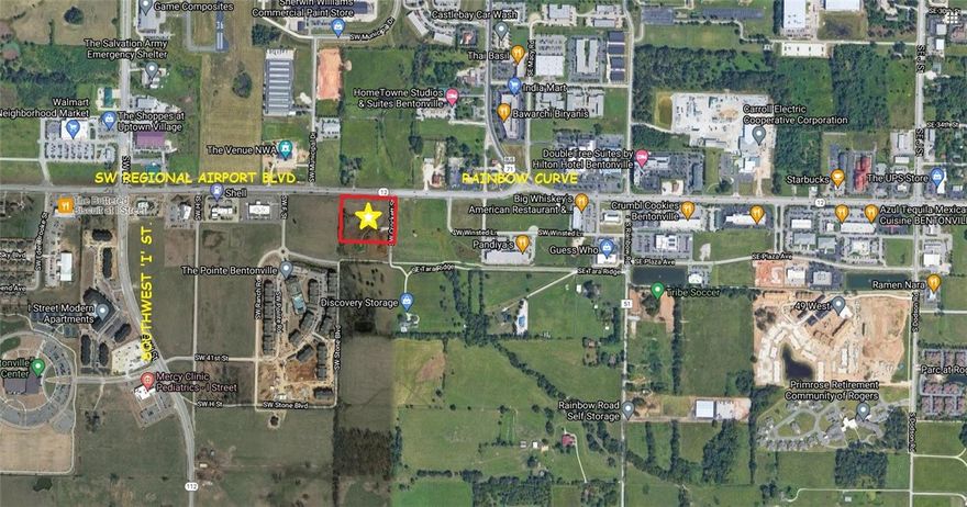 3.12(+/-) acres of land available for sale in Bentonville. Prime commercial property with 417' of frontage on SW Regional Airport Blvd. Property division considered.