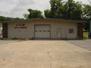 Perfect Location!! If you're a mechanic needing more room or thinking of opening your own auto repair business, then look no further. This downtown location on Highway 7 has been an auto repair business for the last 30 years! Sale includes 4500 square feet of heated and cooled space with two overhead doors, a customer counter, and private office