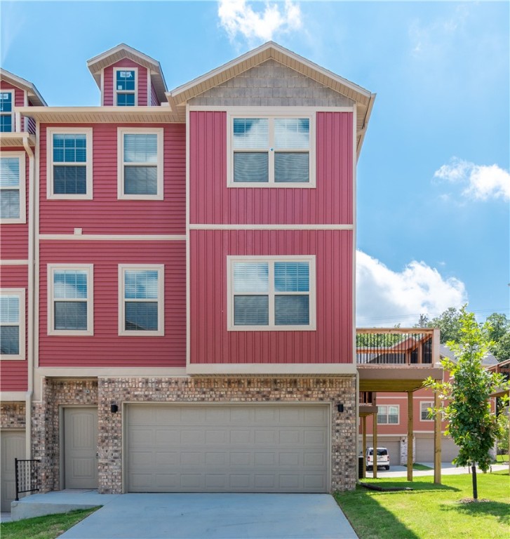 Now available for rent in Fayetteville! This 2 bed, 2.5 bath townhouse at 2819 W Auburn Ave. Kitchen and living room feature beautiful hardwood floors and stainless steel appliances. Enjoy outdoor living with two spacious decks, plus a 2-car garage for added convenience. Located just minutes from I-49, the University of Arkansas, and all that MLK Jr. Blvd. has to offer - shopping, dining, and quick access around town. This home is move-in ready and offers a low-maintenance lifestyle in a prime location! No pets.