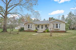 If you have been searching for a home in the Mill Creek area this may be it. The house has new paint and flooring throughout. There is a 30x30 shop, two other storage buildings and a little over five fenced acres. This home also boasts a 5000 dollar security system with several cameras located on the property. All this a little over 10 minutes from town on Bailey Loop.