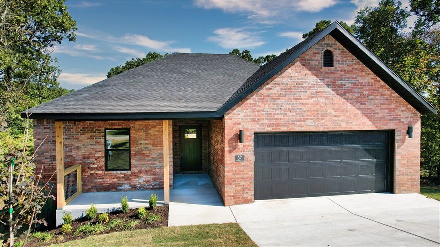 Tradition outside, a fresh take within—this newly built 3-bed/2-bath Bella Vista home blends timeless curb appeal & a bright, open interior designed to feel like home. Enjoy natural light throughout, a granite island, SS appliances, walk-in pantry & cozy dining nook. LVP flooring, curated lighting, laundry room & recirculating water heater boost everyday comfort. Step out to a covered porch & private backyard framed by trees—perfect for coffee or weekend gatherings. A 2-YEAR Builder’s Warranty brings peace of mind. Whether hosting or unwinding in Ozark serenity, this home moves with your rhythm. Minutes from Walmart Super Center, Scotsdale Golf Course & Branchwood Rec Center—perfectly positioned for active, fulfilling living.  Use the preferred lender for an additional $3500 towards Closing Costs.