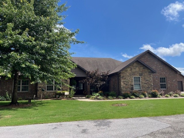 Immaculate home in perfect location close to schools, downtown area, walking paths and sports venues. 3 bedroom, 2 baths, office/library, 2 dining areas and a very nice kitchen with range and separate extra oven and microwave. Open split floor plan, large living room with cathedral ceiling and a gas log fireplace. Master bedroom is large with a walk-in closet and sitting or work out space. Master bath has a soaking whirlpool tub, a separate wheelchair accessible shower and a double vanity. Beautiful landscaping, fenced yards, salt water self cleaning pool, lower deck by pool and an upper deck with fantastic views. Extra garage could be a mother-in-law house or guest house. Space with bath already there. A 600 sq.ft. storage building with garage door is there too. This is a must see property.