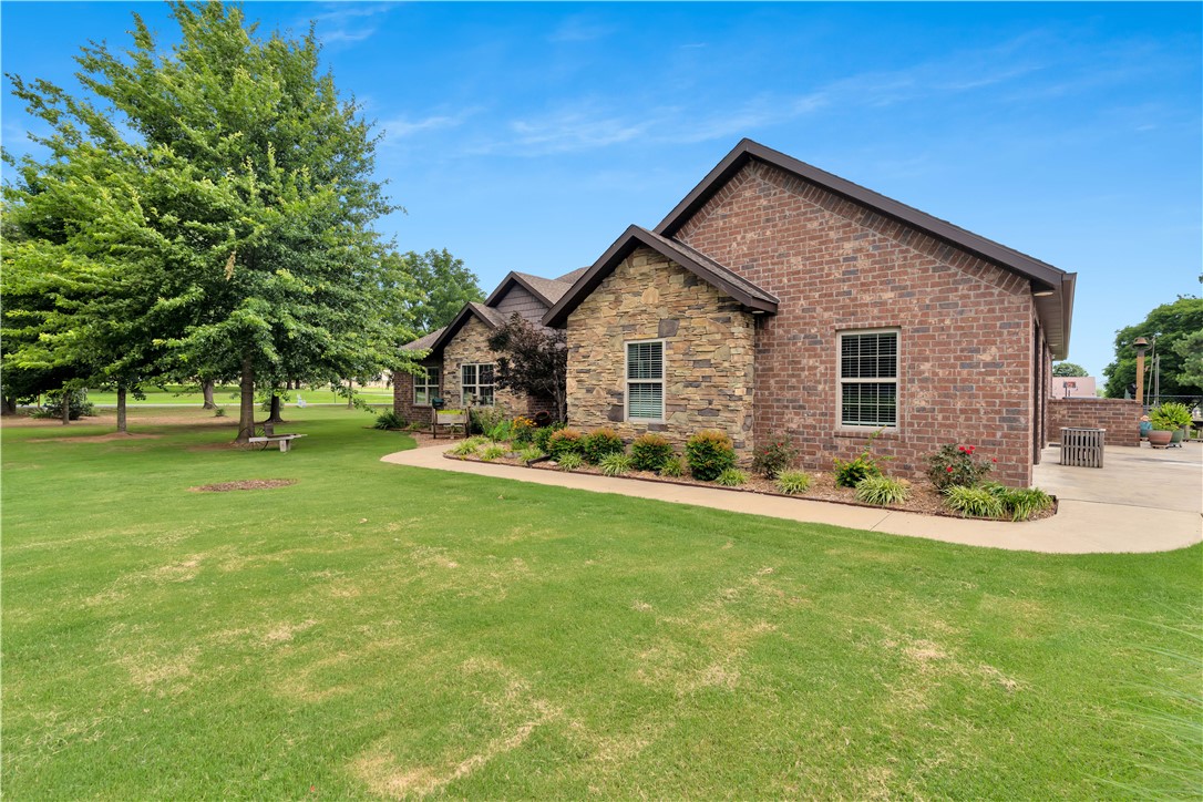 Immaculate home in perfect location close to schools, downtown area, walking paths and sports venues. 3 bedroom, 2 baths, office/library, 2 dining areas and a very nice kitchen with range and separate extra oven and microwave. Open split floor plan, large living room with cathedral ceiling and a gas log fireplace. Master bedroom is large with a walk-in closet and sitting or work out space. Master bath has a soaking whirlpool tub, a separate wheelchair accessible shower and a double vanity. Beautiful landscaping, fenced yards, salt water self cleaning pool, lower deck by pool and an upper deck with fantastic views. Extra garage could be a mother-in-law house or guest house. Space with bath already there. A 600 sq.ft. storage building with garage door is there too. This is a must see property. Weather vane does not convey.