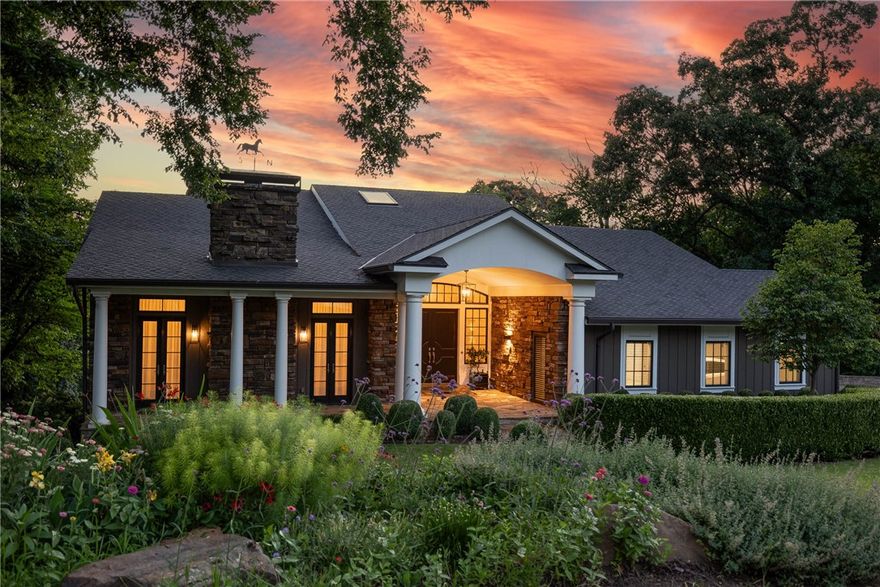 Welcome to Sunset Rock, a beautifully updated estate in the heart of town. Spanning 5,355 sq ft & set on two lots totaling 0.92 acres, this meticulously maintained home offers elegant living. Completely remodeled in 2015-2016, no detail was overlooked. Renovation included new electrical, plumbing, ductwork, insulation, heating & air, flooring, windows, lighting, walls, staircases, porches, & roof. Property features four covered patios, perfect for enjoying stunning sunsets & breathtaking views to Oklahoma. Circular driveway leads to a 5-bedroom, 4.5-bath home spread across three levels. Custom details are evident throughout, highlighted by a spectacular owner’s suite with a bath featuring a soaker tub & a large walk-in shower. Finished walk-out basement opens to a covered patio overlooking a private in-ground gunite saltwater pool. The professionally landscaped grounds offer a serene retreat right at home. Experience luxury & comfort where every detail has been thoughtfully designed for sophisticated living.