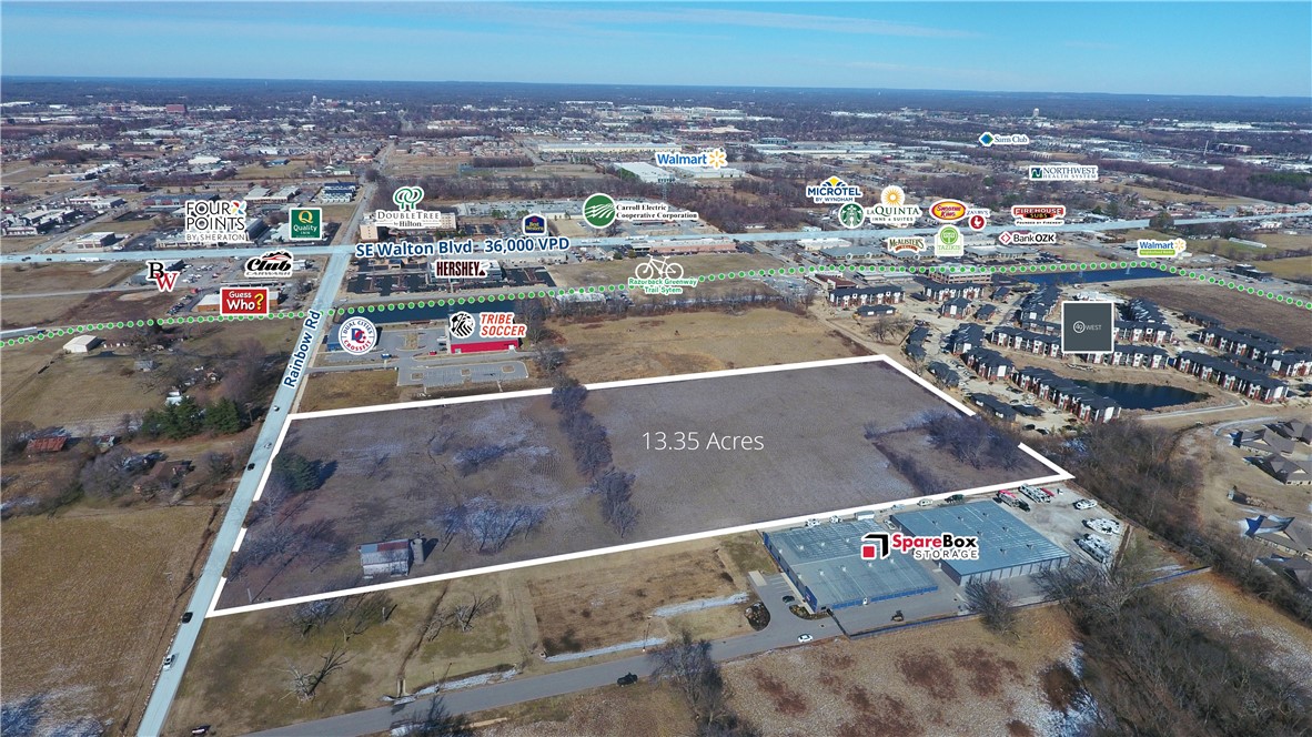 Large tract of land south of bustling SE Walton Blvd with 13.35 acres. Property is near several retailers and convenient to both Rogers and Bentonville amenities with quick access to Interstate 49 and major arterial roads. Potential and best use is for garden-style / mid-rise multifamily project or active adult community.
• +/- 13.35 acres
• Zoned “T5.1,” Town Center Low in Rogers jurisdiction
• Zoning allows for a mix of office, mixed-use, multifmaily and commercial buildings
• 500 feet of frontage on Rainbow Road
• High growth area of Rogers that is immediately adjacent to Bentonville and SE Walton Blvd
• 2.6 miles from t 350-acre Walmart Home Office campus