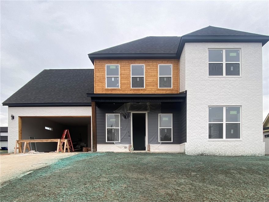 Discover this beautifully designed new construction home in the heart of Rogers! Featuring 4 bedrooms, 2 and a half bathrooms, and a versatile bonus room upstairs—perfect for a media room, second living area or whatever you can dream up! The open-concept layout includes a bright, eat-in kitchen with modern finishes, ideal for everyday living and entertaining. Enjoy a prime location within walking distance of the Rogers Aquatic Center and just minutes from shopping, dining, and entertainment. Thoughtful design, quality craftsmanship, and unbeatable convenience make this home a must-see!
