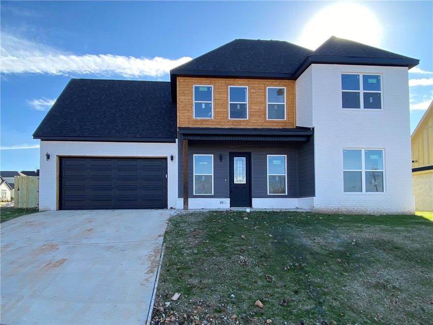 Discover this beautifully designed new construction home in the heart of Rogers! Featuring 4 bedrooms, 2 and a half bathrooms, and a versatile bonus room upstairs—perfect for a media room, second living area or whatever you can dream up! The open-concept layout includes a bright, eat-in kitchen with modern finishes, ideal for everyday living and entertaining. This home also features an energy efficient dual fuel heating system. Enjoy a prime location within walking distance of the Rogers Aquatic Center and just minutes from shopping, dining, and entertainment. Thoughtful design, quality craftsmanship, plenty of storage spaces and unbeatable convenience make this home a must-see!