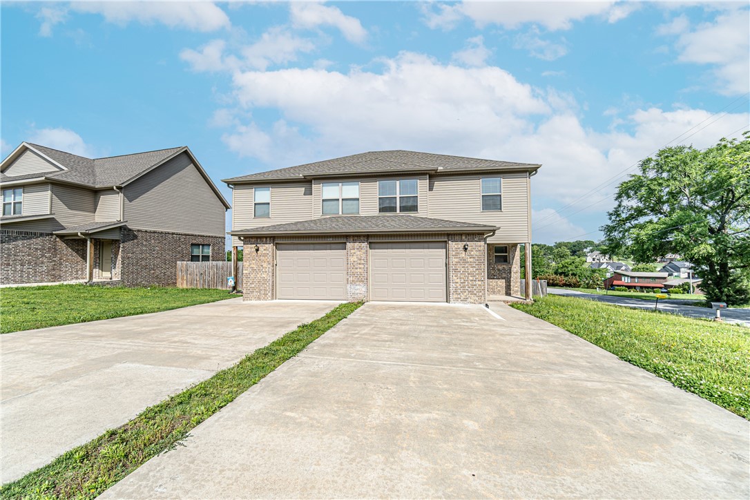 3 bedroom 2 1/2 bath duplex with all appliances - Solid surface flooring in kitchen & living room.