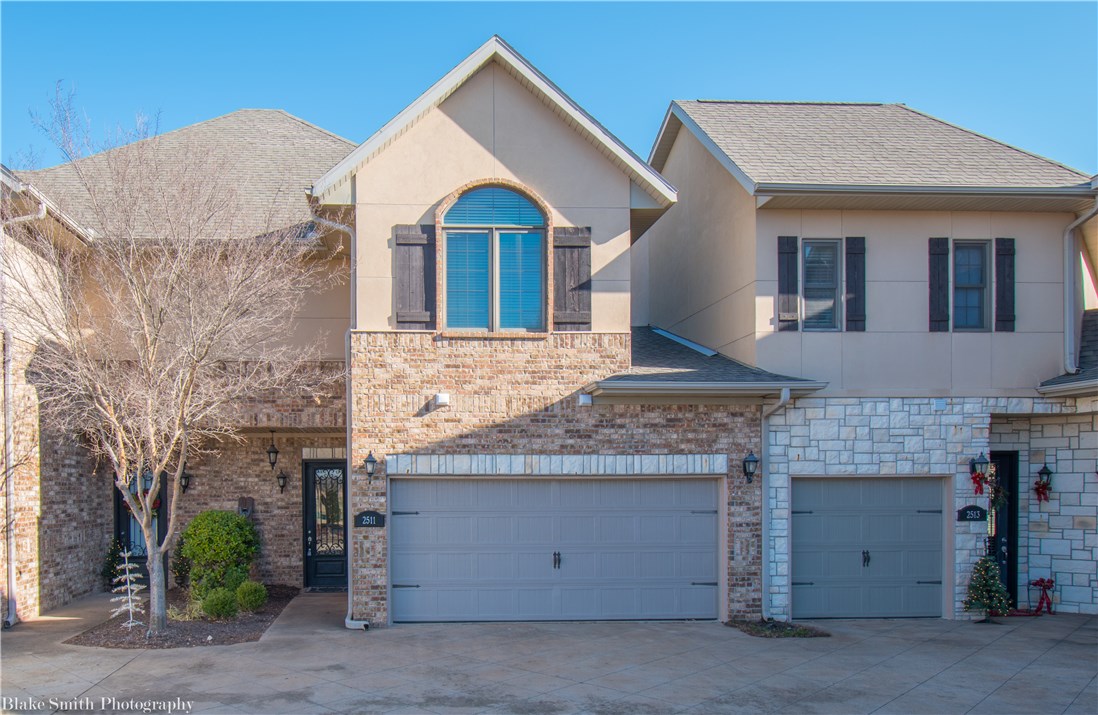 Check out this 2 bed, 2.5 bath luxury condo in the heart of Rogers! Minutes from the promenade, Top Golf, Walmart AMP, dining, and so much more! Condo features granite countertops, nice patio, 1 car garage, and 2 master bedrooms each with own ensuite