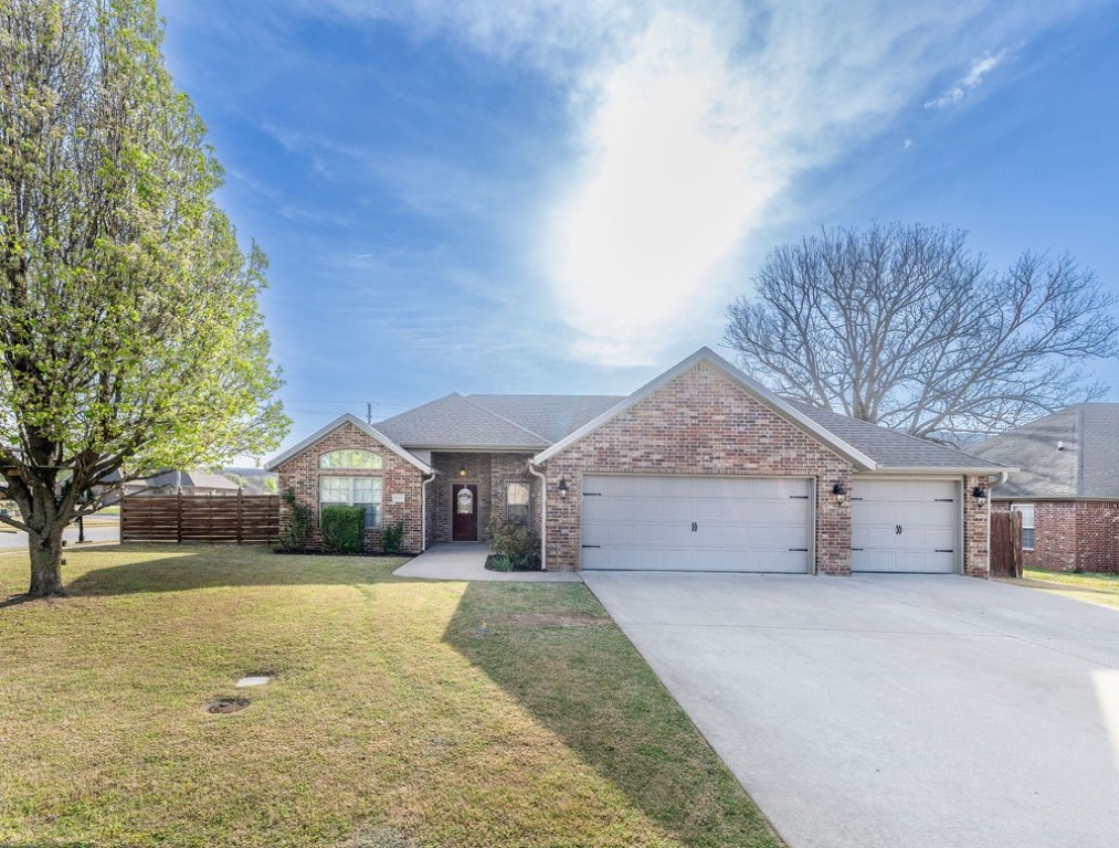 Welcome to this charming 3-bedroom, 2 Bathroom home on a desirable corner lot in Meadowsweet subdivision of Prairie Grove! This beautiful home offers an inviting, open split-floor plan with plenty of natural light, a spacious living area, formal dining/ office space, and an eat-in kitchen perfect for entertaining. The primary suite features a private whirlpool tub, double vanity, walk-in closet with plenty of storage throughout, additional bedrooms provide comfort and flexibility. Enjoy the outdoor living in the large backyard with a swing set, custom privacy fence ideal for entertainment or relaxing evenings. Conveniently located near schools, parks, bike/walking trails, and all prairie grove has to offer.