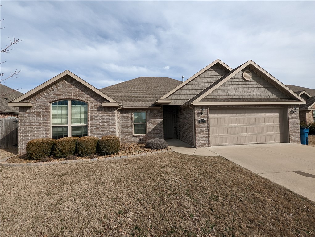 Welcome to your next home in a great Bentonville location. 3 bed, 2 bath, 2 car garage. Beautiful wood look tile through out the home. Neutral color schemes and an open floor plan makes this home feel light and bright. Wood privacy fenced back yard. Backgound and credit check required