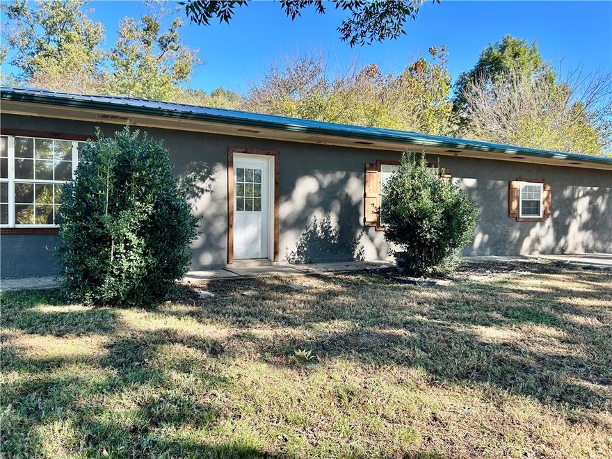 Spacious 4-bedroom home just 10-15 minutes from town and near beautiful Petit Jean Mountain State Park! This property offers a peaceful country setting with two large outbuildings- perfect for storage, hobbies, or a workshop. Inside, you'll find the home features a generous floor plan with large closets and plenty of room for a growing family. Currently one bath but could easily be converted to two full baths. Enjoy a double carport, and sits on a beautiful piece of land, Great price and incredible potential-don't miss this opportunity!